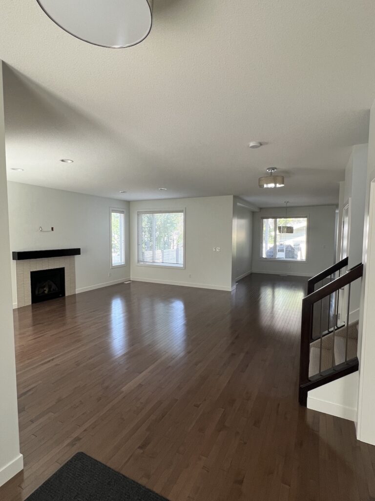 Interior home painting project featuring a vibrant accent wall in a stylish Edmonton home.