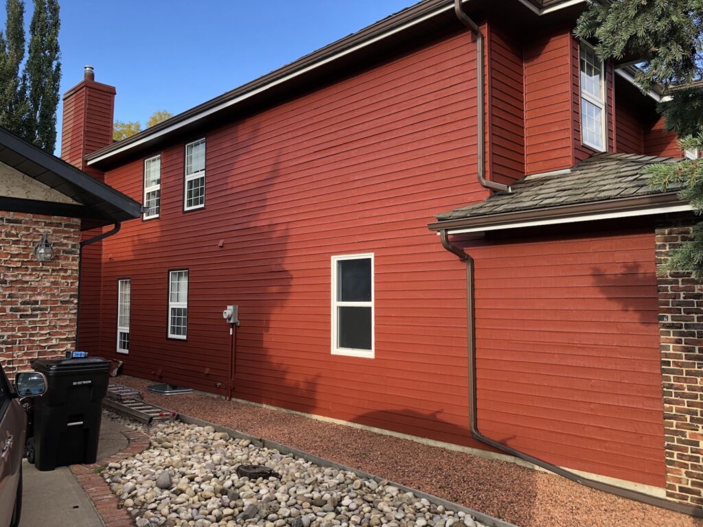 Beautifully painted home exterior with a fresh coat of durable paint in Edmonton.