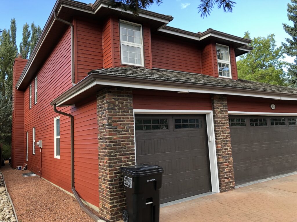 Beautifully painted home exterior with a fresh coat of durable paint in Edmonton.