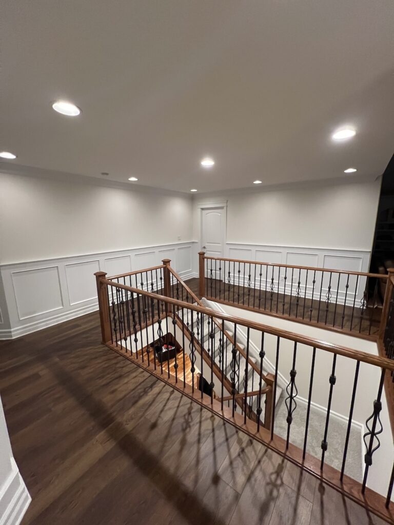 Interior home painting project featuring a vibrant accent wall in a stylish Edmonton home.